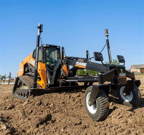 grading with a compact track loader|grading with track loader.